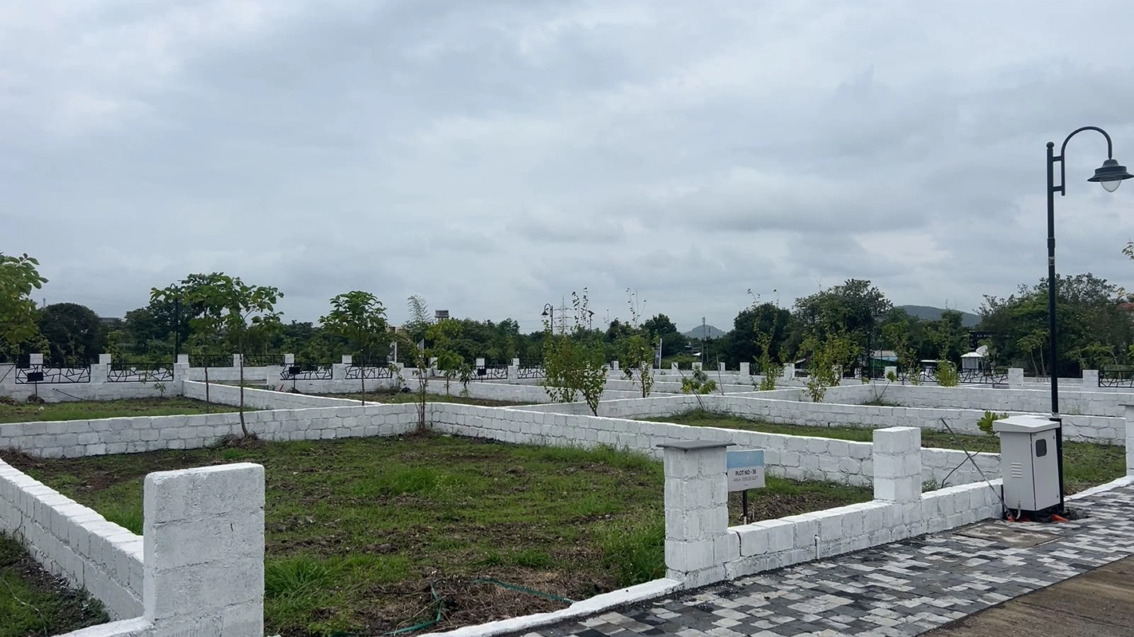 Vogue Estate — individual plot with boundary wall