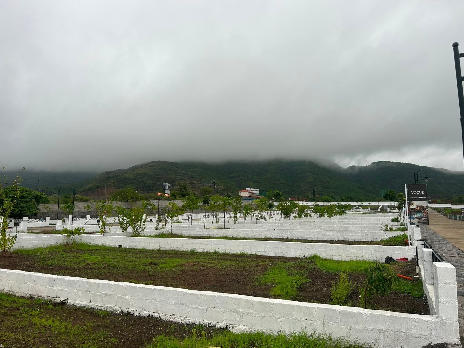 Vogue Estate — site plots with scenic hill view